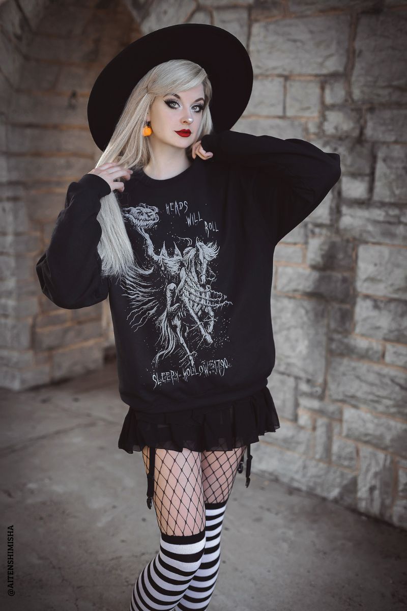 comfy goth gothic sleepy hollow sweater worn with striped tights and fishnets 