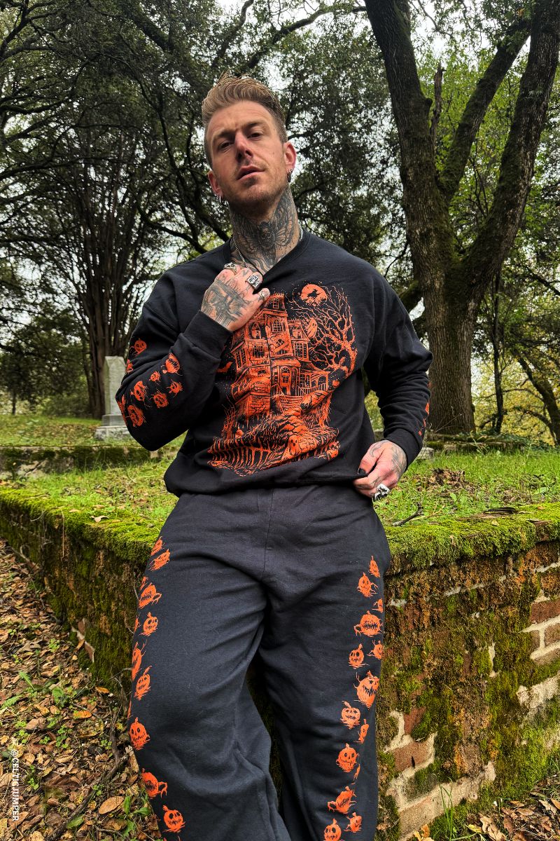 gothic orange haunted house sweater