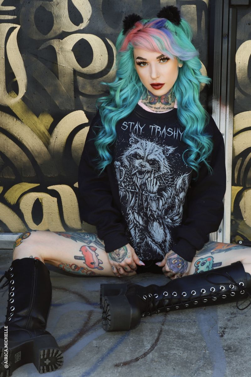 punk raccoon sweater