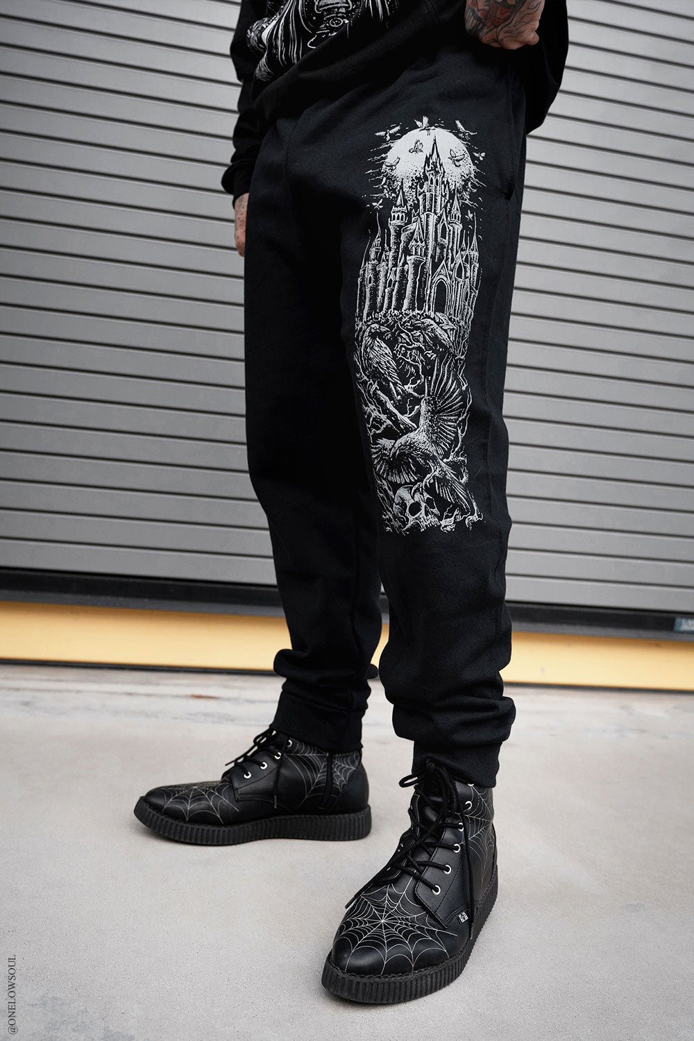 gothic sweatpants with printed castle and ravens on the leg