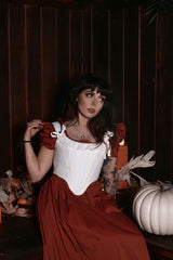 cute white corset with pointed asymmetrical hem and lace trim