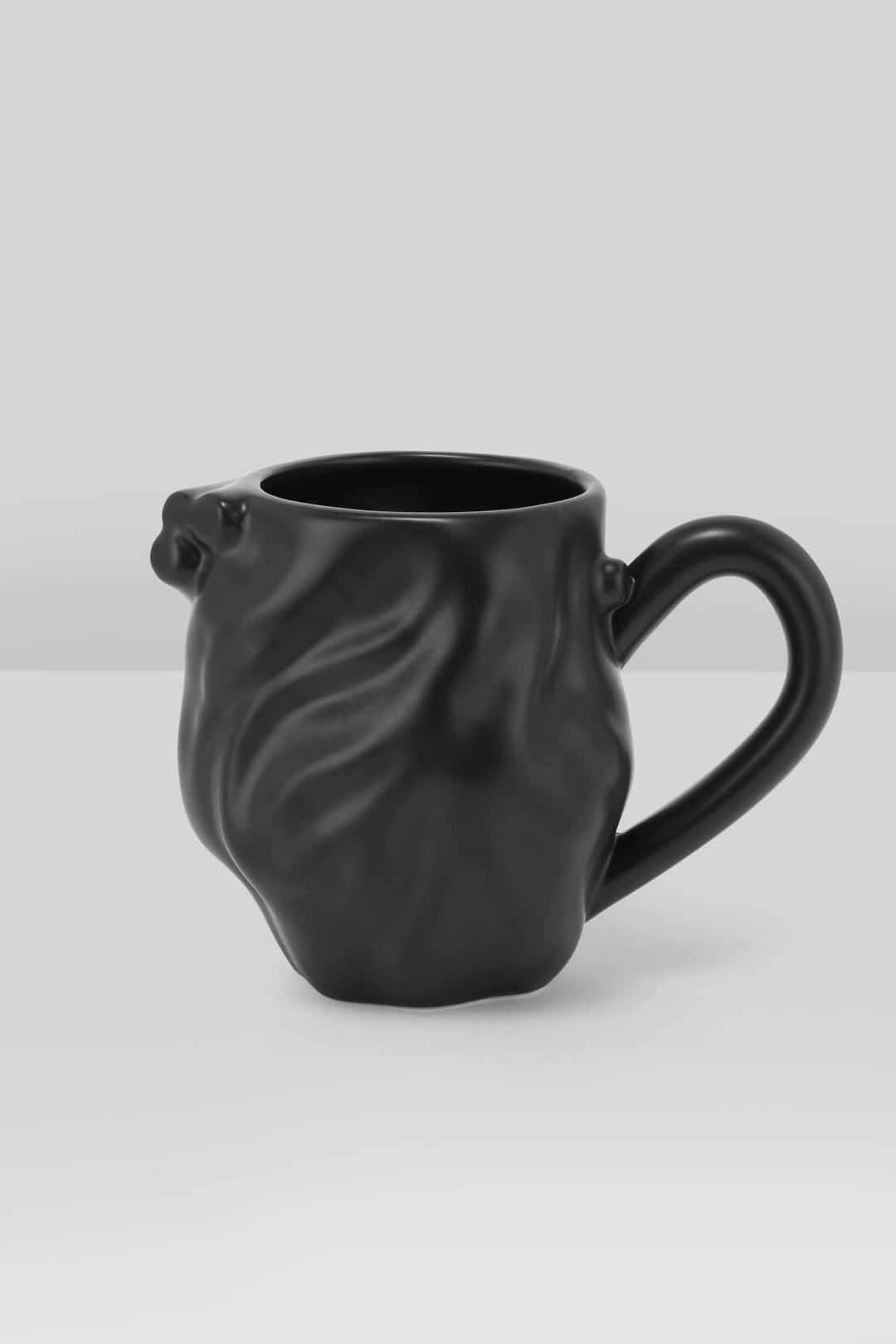 creepy black coffee cup