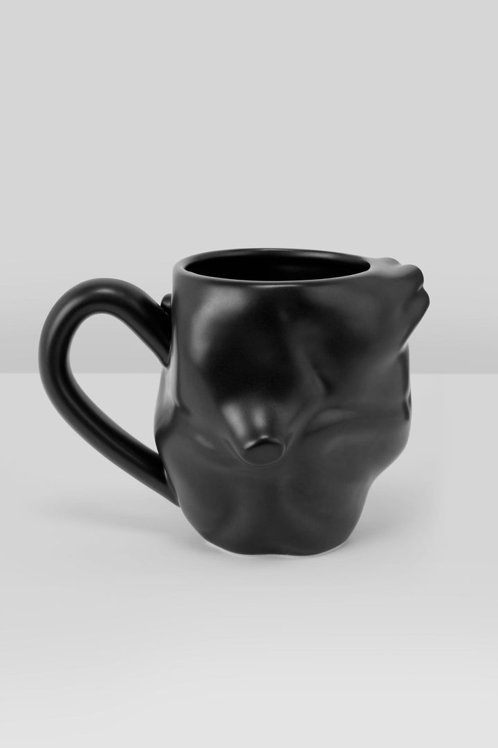 black anatomical heart shaped  coffee cup