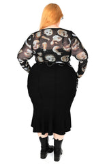 Long sleeve top with broken doll print available in plus sizes