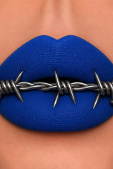 Bold lip color from Curst Kosmetics goth makeup