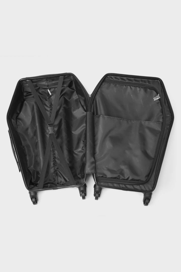 black coffin-shaped bag