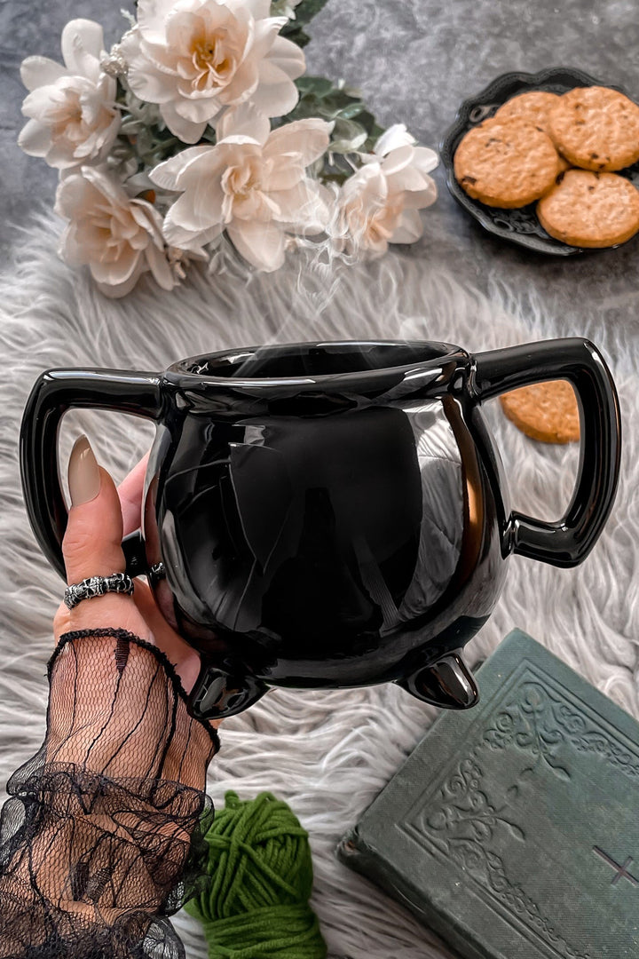 black ceramic witch cauldron coffee cup