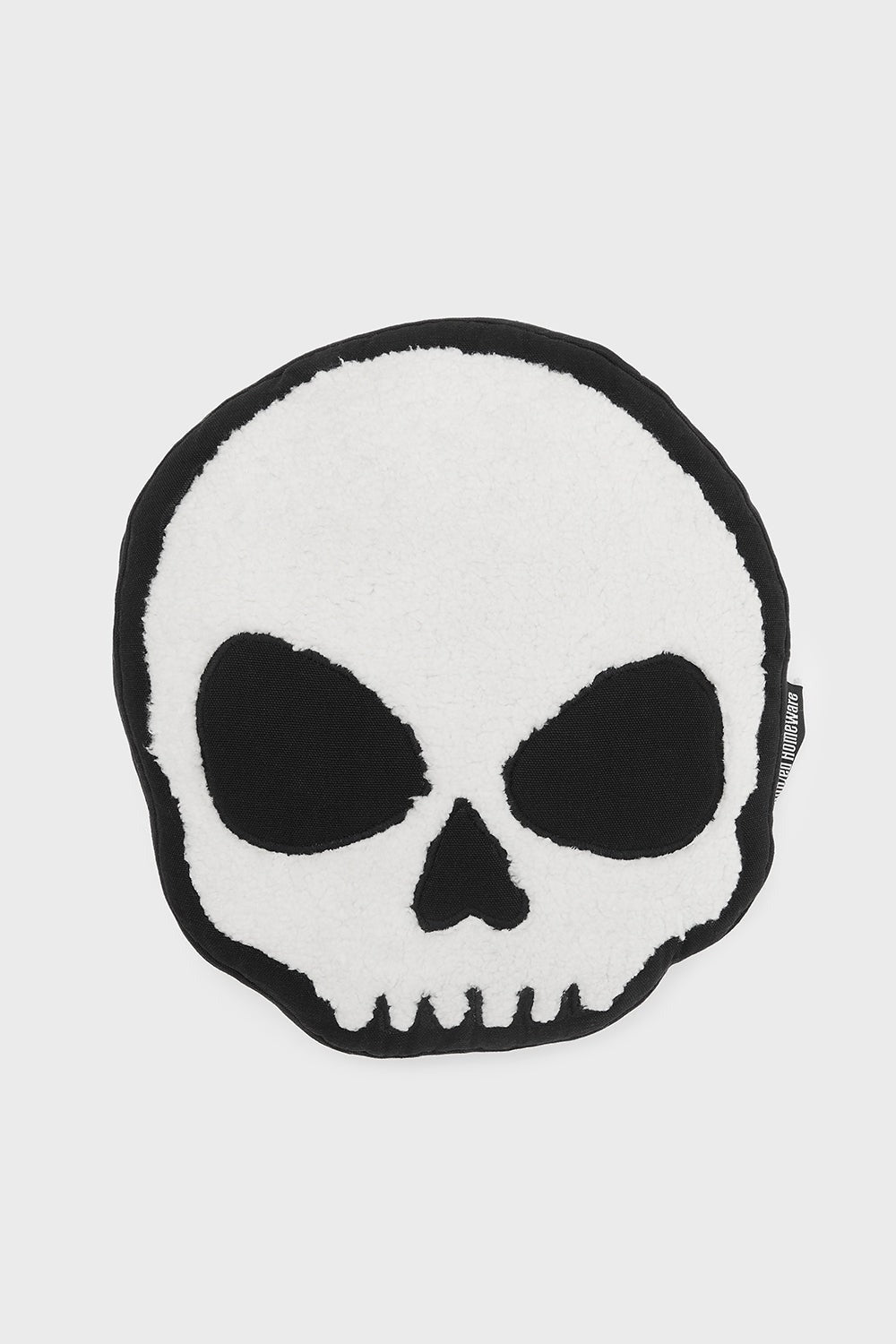 skull-shaped throw pillow