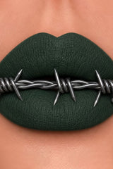 Bold matte green lip color from Curst Beauty