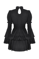 Back details of goth puff sleeve dress with cinched waist