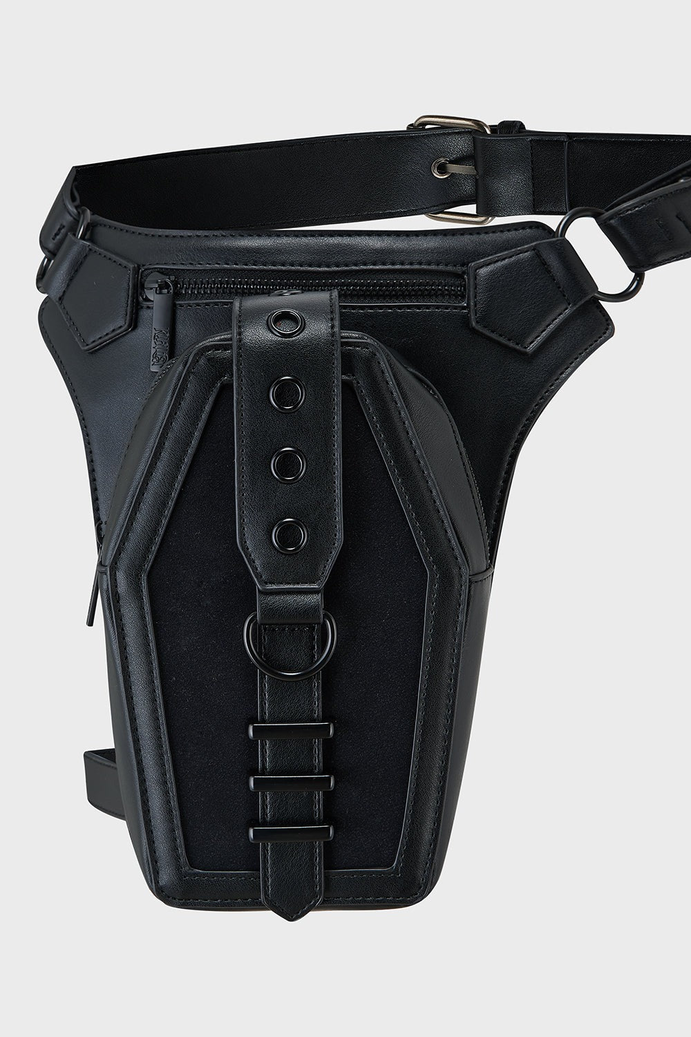 Black leather holster with belt on a light gray background