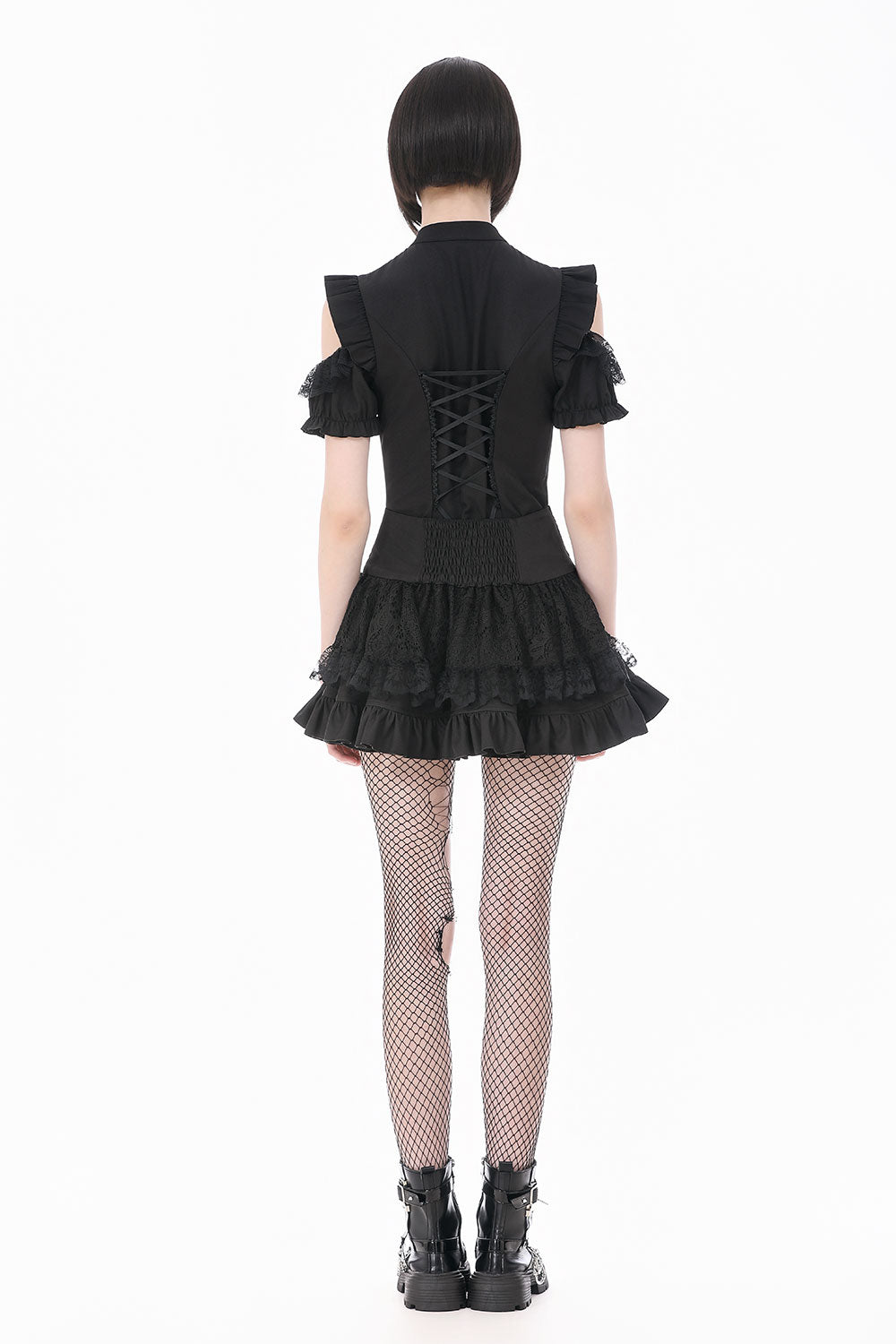 Back view o black punk skirt with charms and zippers