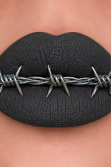 Bold matte gray lip gloss from Curst Kosmetics
