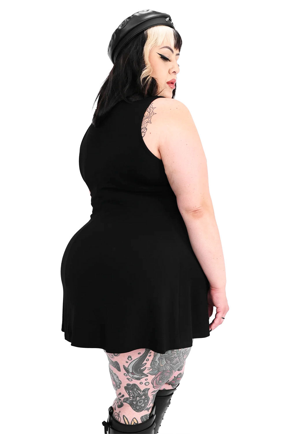 All black fitted mini dress on model