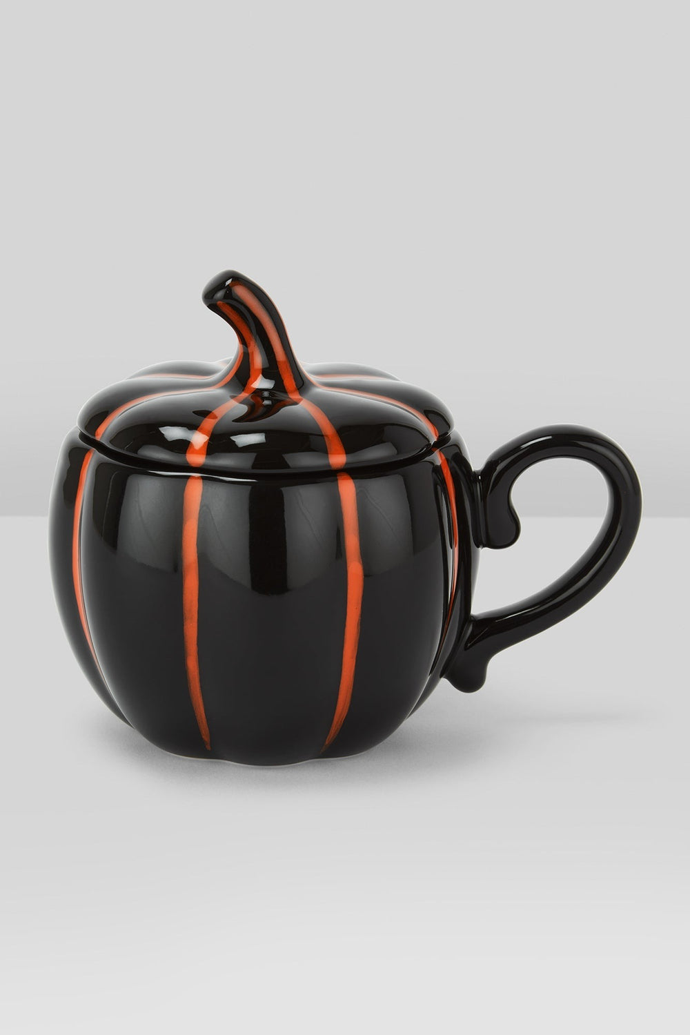 halloween mug shaped like a pumpkin