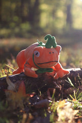 Pumpkin Toad plush toy on log