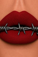 Bold matte red lip gloss from Curst Kosmetics