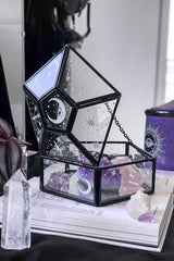 Caja de cristal con luz de estrellas