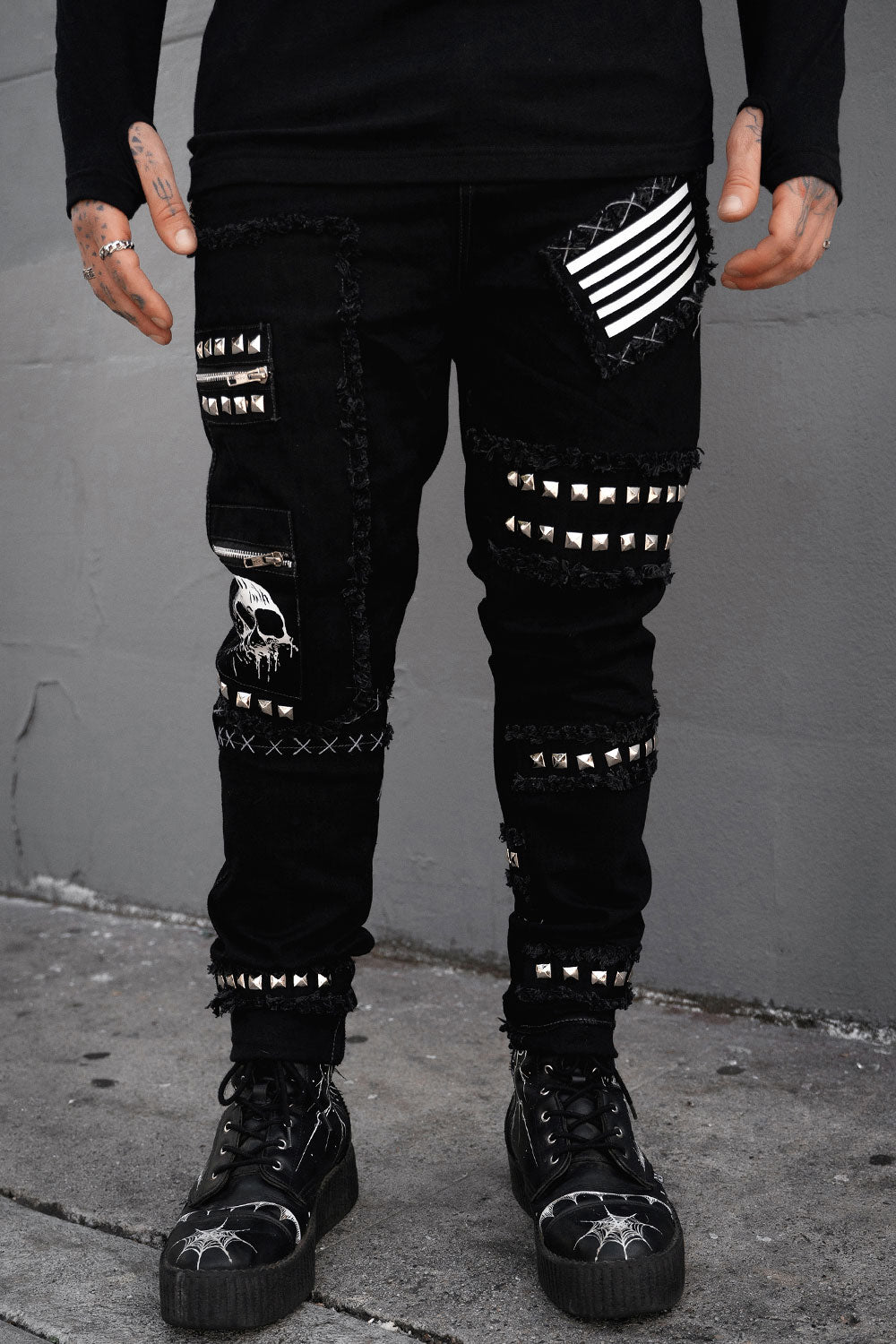 mens gothic pants with zippers, patches, and studs