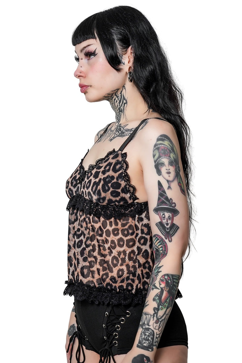 flared open front halter top with bow detail