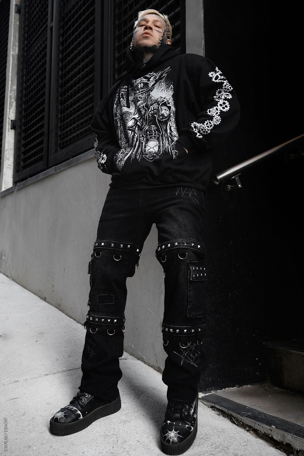 gothic mens pants with studs, exposed stitches, and d-rings