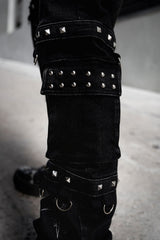 gothic mens pants with studs, exposed stitches, and d-rings in an aged wash