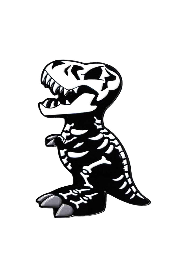 Black and white dinosaur skeleton enamel pin on a white background