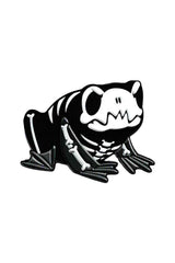 Black and white skeleton frog pin on a white background