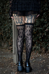 Thigh high stockings with widow spider details
