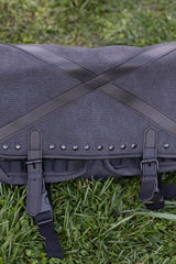 Dark alternative tactical shoulder bag with distressed grey fabric metal D rings and utility pouches for punk grunge and emo outfits