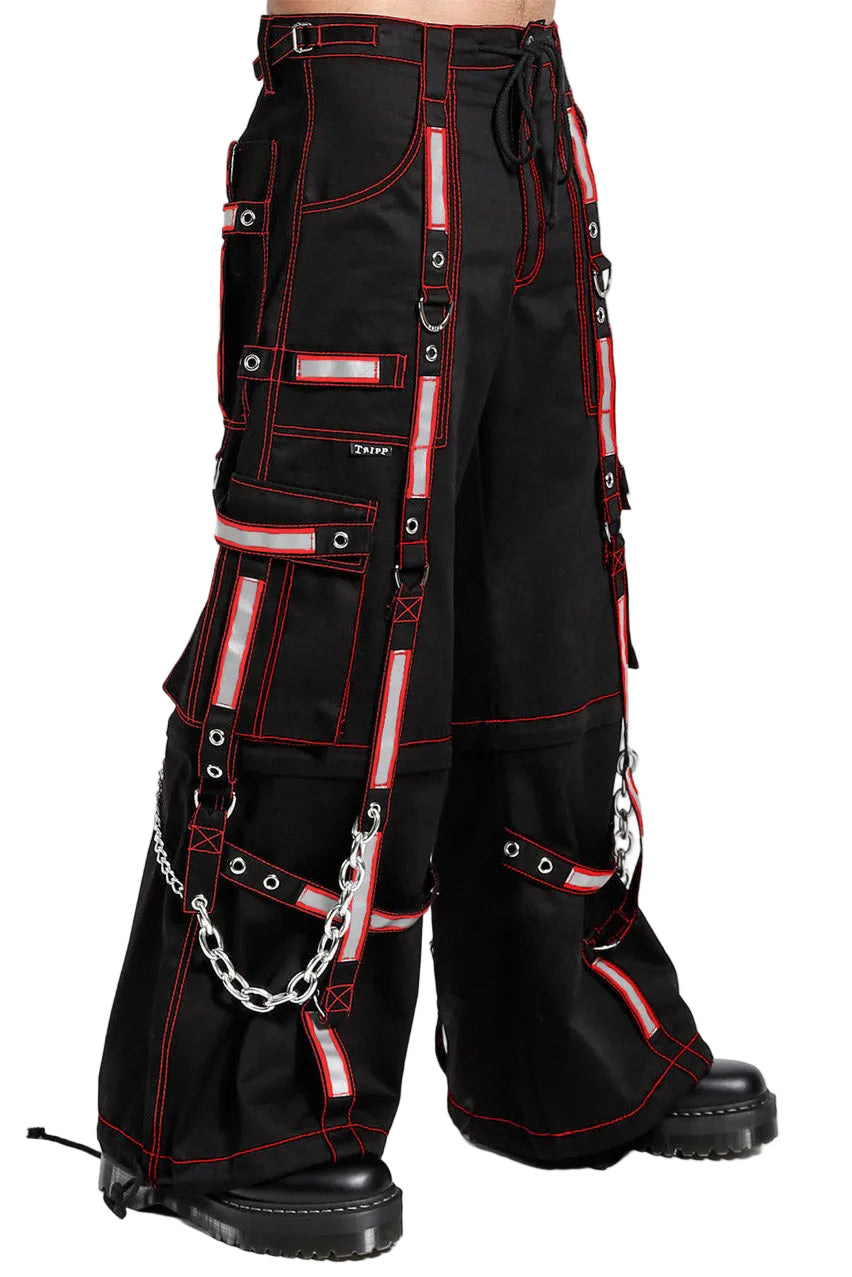 Black pants with red accents and chains on a white background