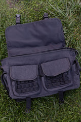 Gothic tactical messenger bag with buckle straps metal hardware and multiple utility pockets for goth punk emo and grunge fashion lovers