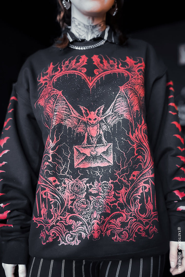 bat red and black sweater