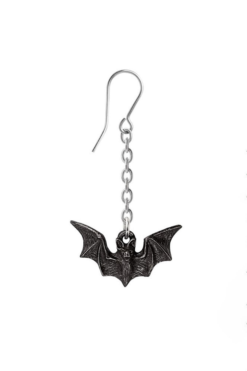 Bat-shaped earring on a white background