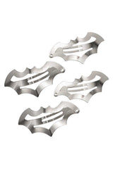 Four metallic bat-shaped hair clips on a white background