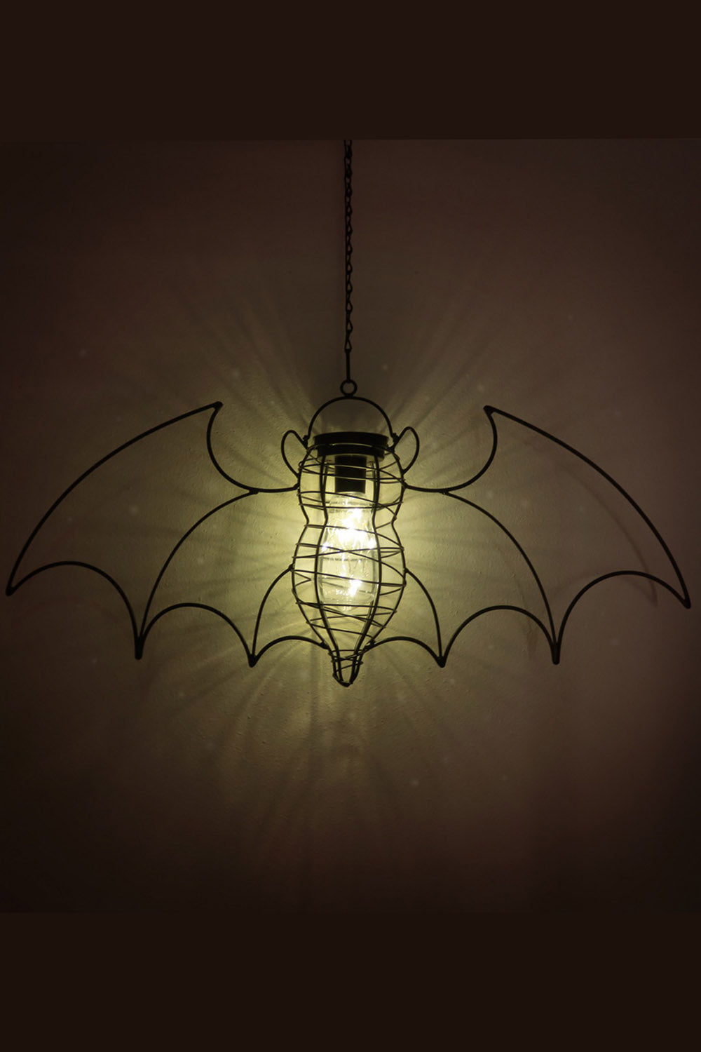 gothic outdoor light shaped like a bat made of iron