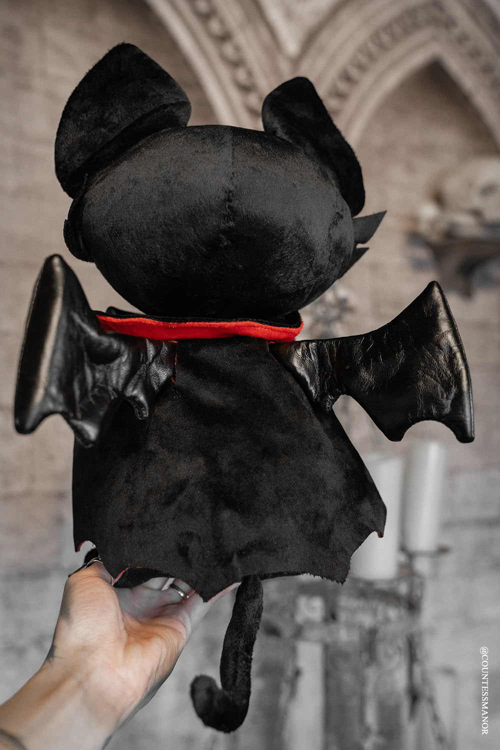 vampire kity plush toy wearing cape