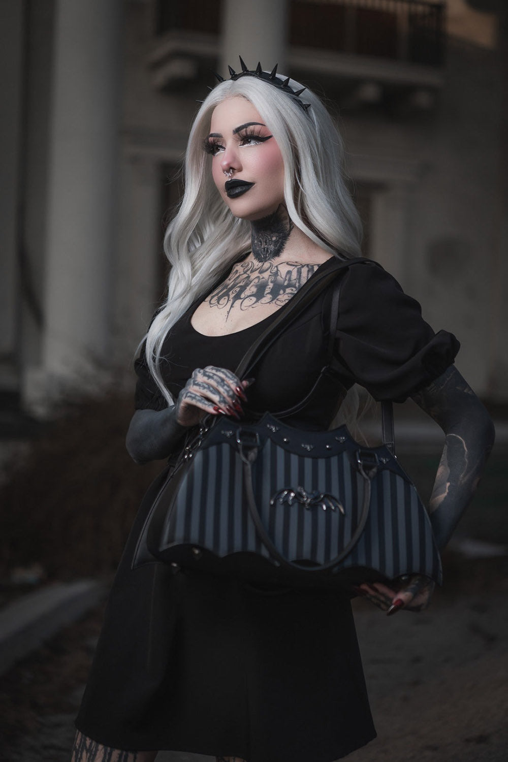 rock rebel black and grey striped bag