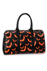 orange halloween bat duffel bag made of vegan leather by foxblood