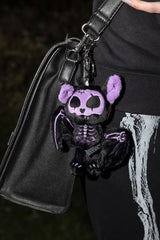 Purple Twilight skelebat plush keychain with spooky skeleton bat design for gothic emo punk and alternative bag accessories