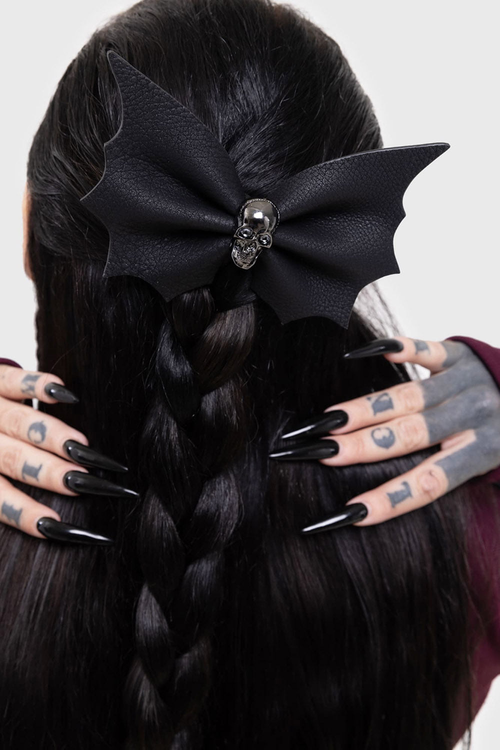 skull charm bat wing hair bow