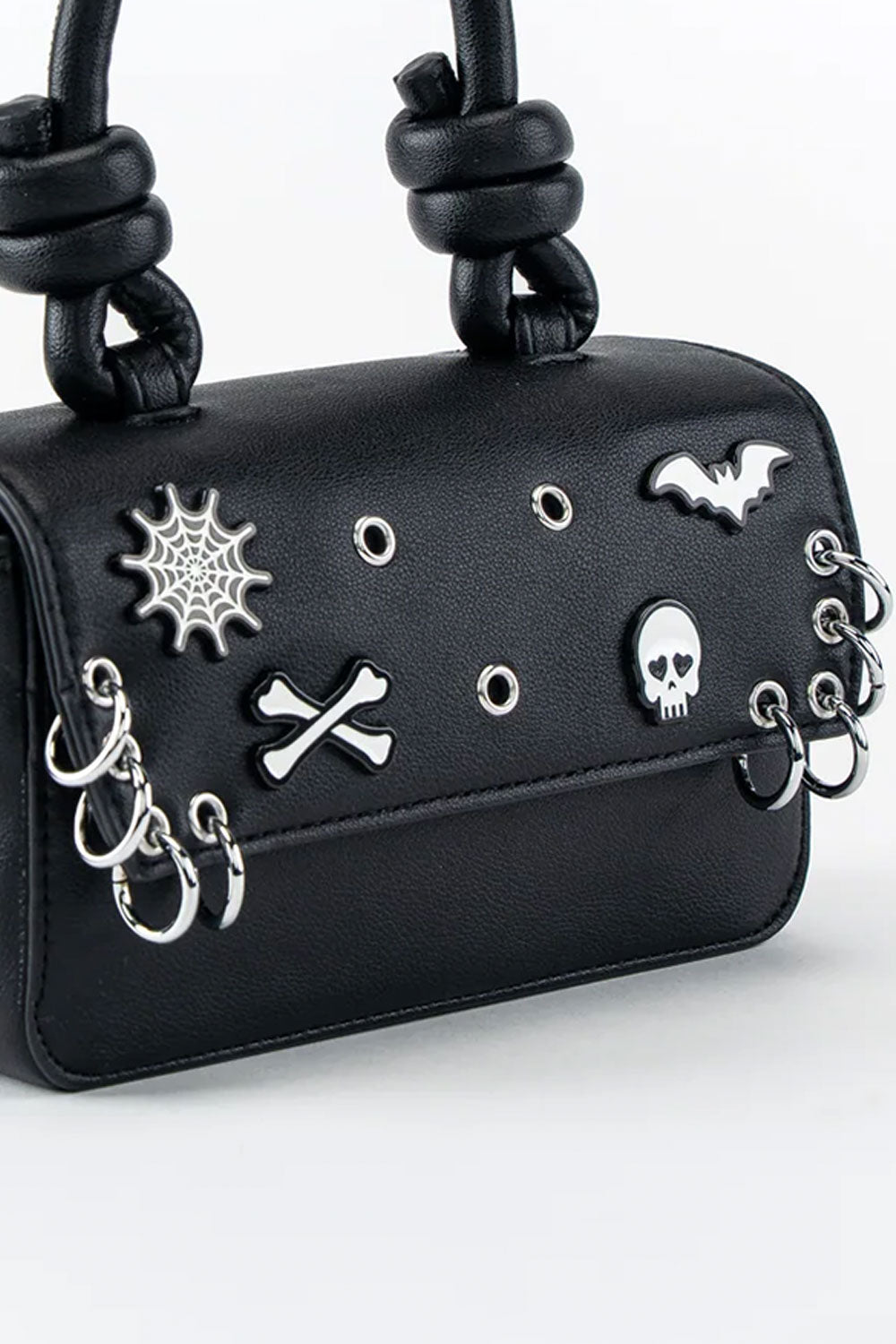 Black goth punk bag with metal charms and piercings