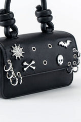 Black goth punk bag with metal charms and piercings