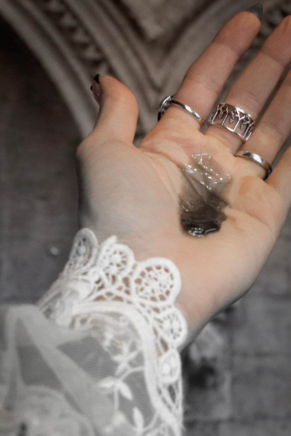 black charcoal shampoo in a coffin bottle