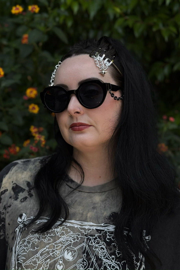large round black sunglasses by the pretty cult