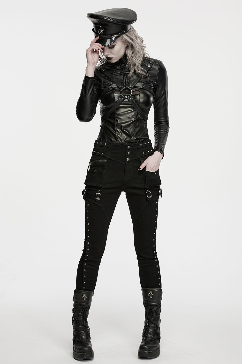 womens black pants with decorative buckle straps arranged at thigh that add classic punk styling details