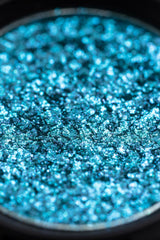 glittery sparkle bright blue iridescent pigmented eyeshadow