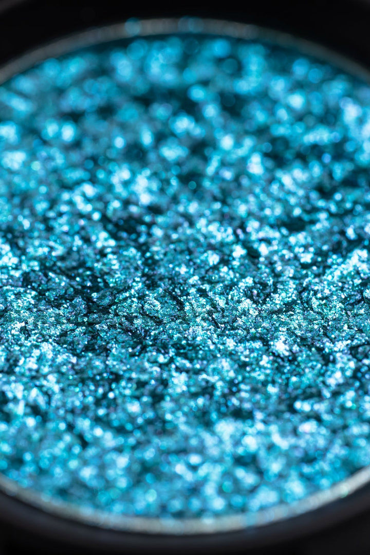 glittery sparkle bright blue iridescent pigmented eyeshadow