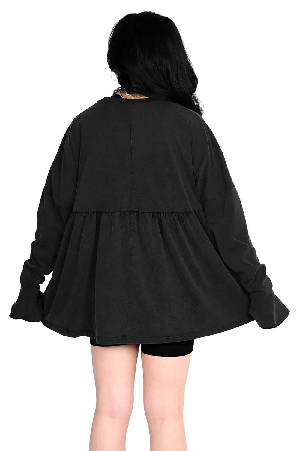 back view of model wearing Long Sleeve Khloe Babydoll Top from Foxblood