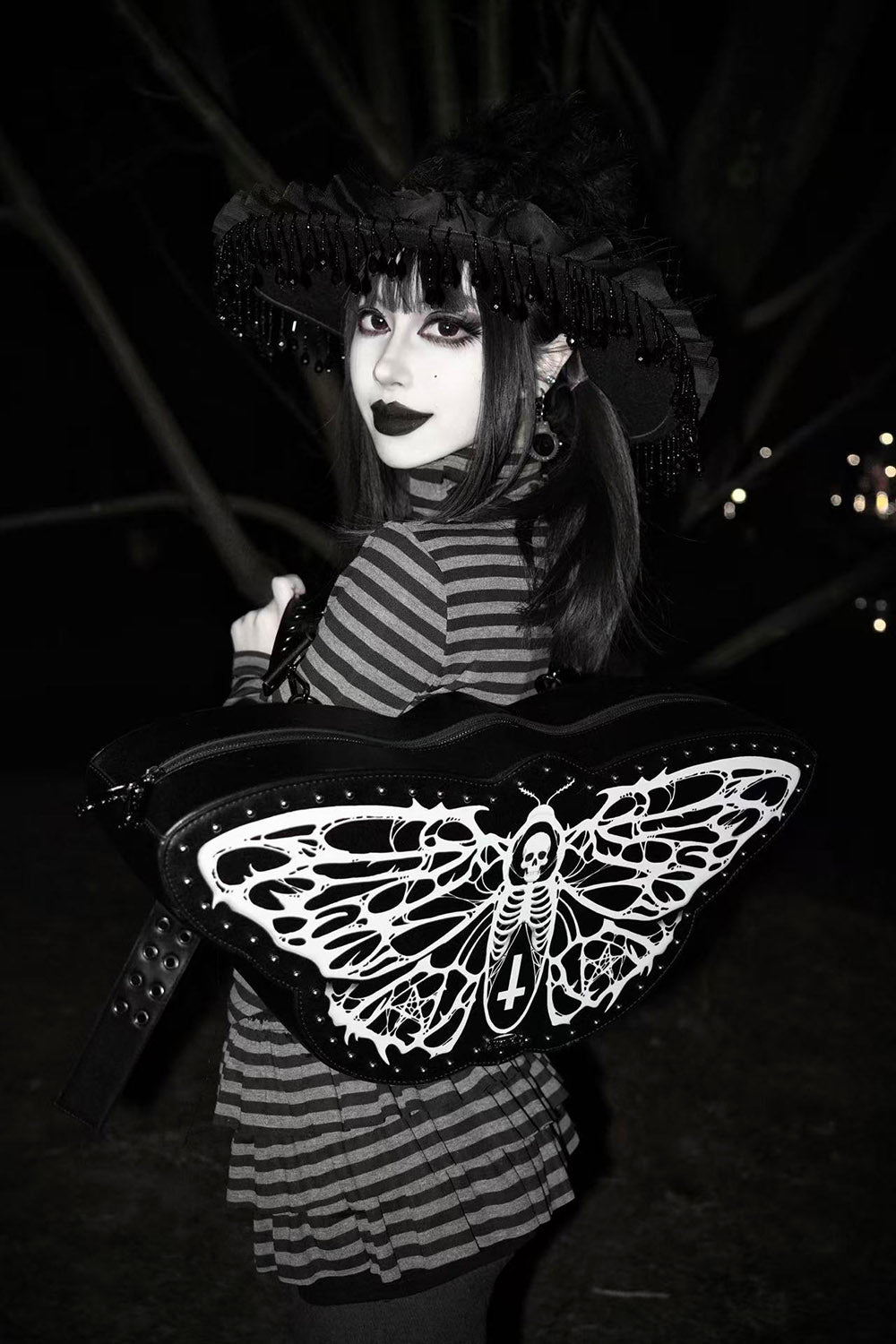 moth skeleton backpack